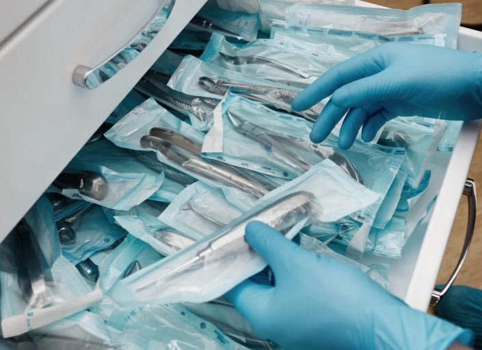 Medical,Laboratory,Technician,Holding,A,Set,Of,Sterile,Disposable,Instruments